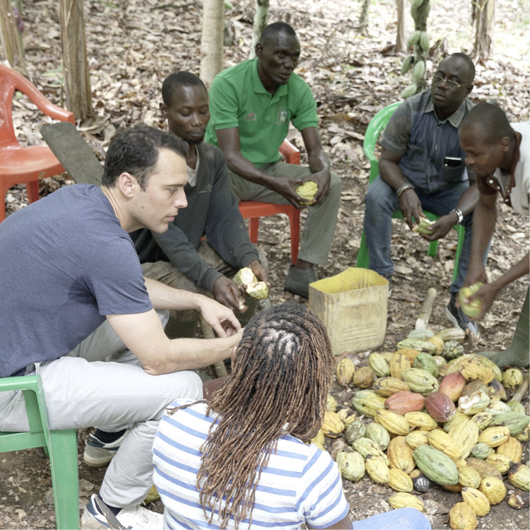 Adriaan Verbeke, Global Head of Ethical Sourcing at Feastables, working with cocoa farmers in West Africa.